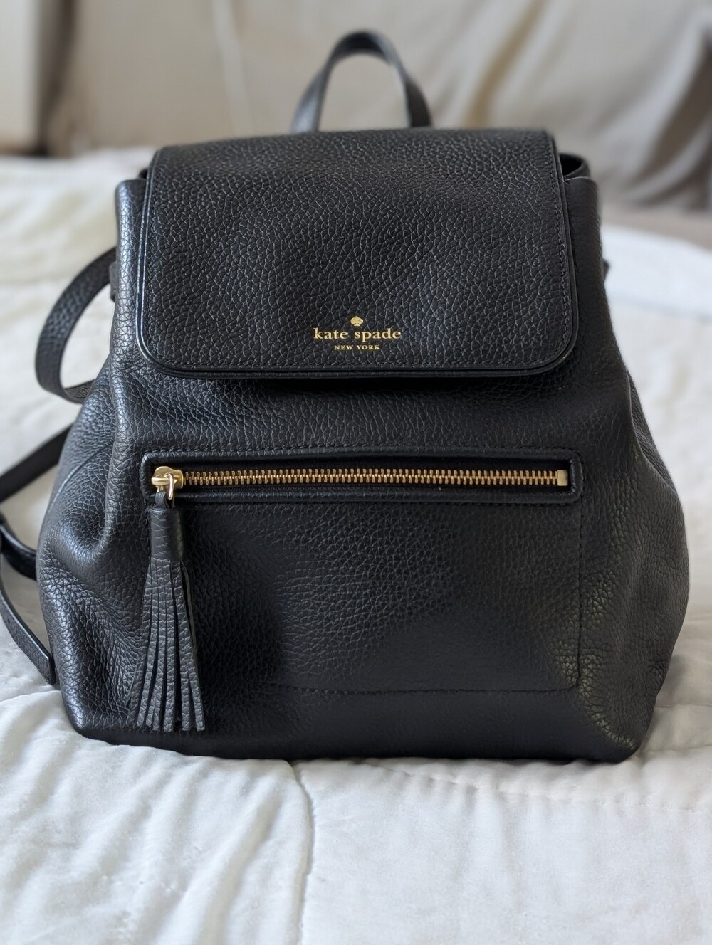 kate spade Black Pebbled Leather Tassel Backpack